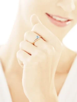 Pierścionek z żółtego złota z diamentami i topazem - próba 585