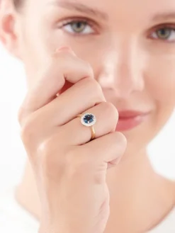 Pierścionek z żółtego złota z diamentami i topazem London Blue - próba 585