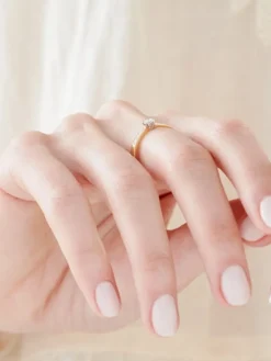 Pierścionek z żółtego złota z brylantami - 0,18 ct - próba 585