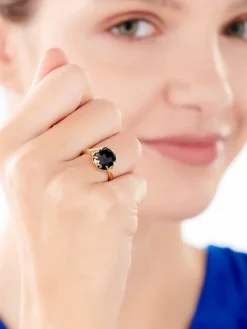 Pierścionek z żółtego złota z diamentami i onyksem - liście - próba 585