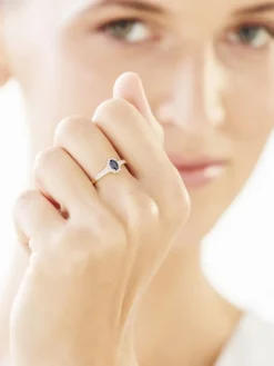 Pierścionek z żółtego złota z diamentami i szafirem - próba 585