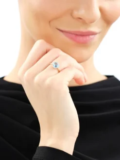 Pierścionek z żółtego złota z diamentami i topazem - próba 585