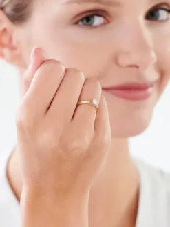 Pierścionek z żółtego złota z brylantem - 0,20 ct - próba 585