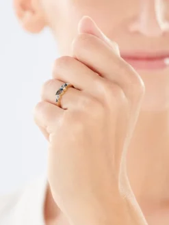 Pierścionek z żółtego złota z brylantem i topazami - próba 375