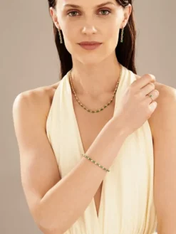 Pierścionek z żółtego złota z diamentami i szmaragdem - próba 375