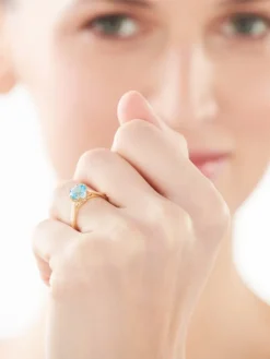 Pierścionek z żółtego złota z diamentami i topazem - próba 375