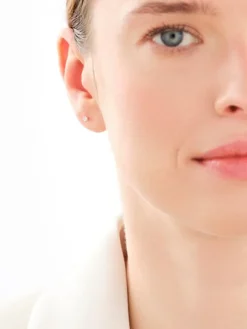 Pojedynczy kolczyk z różowego i białego złota z brylantem - 0,01 ct - próba 375