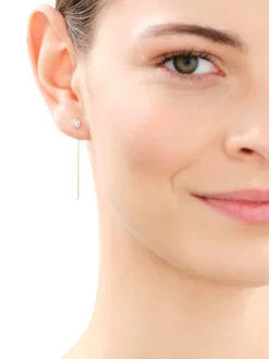 Pojedynczy kolczyk z żółtego i białego złota z brylantem - 0,01 ct - próba 375