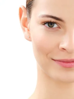 Pojedynczy kolczyk z żółtego i białego złota z diamentem - 0,005 ct - próba 375