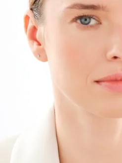 Pojedynczy kolczyk z żółtego i białego złota z brylantem - 0,02 ct - próba 585