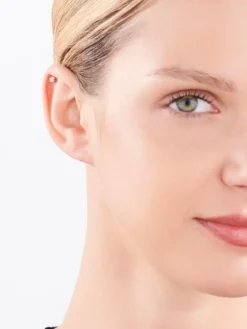 Pojedynczy kolczyk z żółtego i białego złota z brylantem - 0,02 ct - próba 585