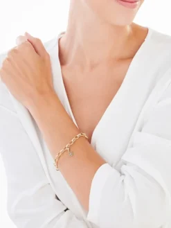 Zawieszka charms z żółtego złota z diamentem - rozeta - 0,005 ct - próba 375