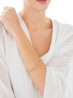 Zawieszka charms z żółtego złota z diamentami - kot - 0,006 ct - próba 375