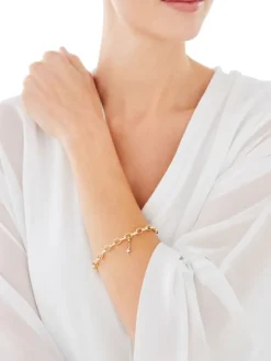 Zawieszka charms z żółtego złota z diamentami - baletnica - 0,01 ct - próba 375