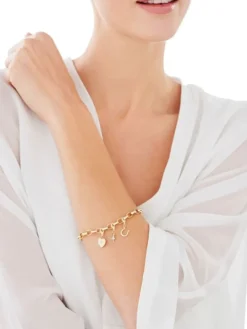 Zawieszka charms z żółtego złota z diamentem - serce - 0,003 ct - próba 375