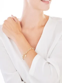 Zawieszka charms z żółtego złota z diamentami - jednorożec - 0,01 ct - próba 375