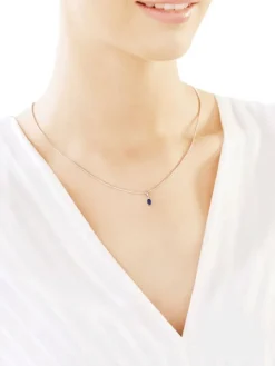 Zawieszka z białego złota z brylantem i szafirem - próba 585