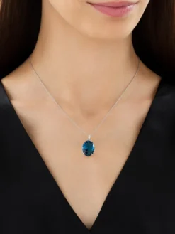 Zawieszka z białego złota z brylantami i topazem London Blue - próba 585