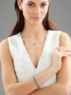 Zawieszka z białego złota z brylantami i szafirami - próba 585