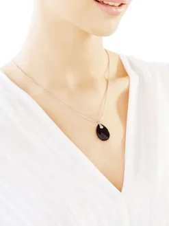 Zawieszka z białego złota z diamentami i onyksem - próba 585