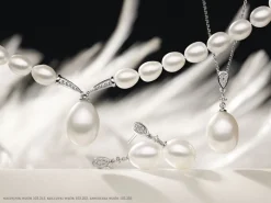 Zawieszka z białego złota z brylantami i perłą - próba 585