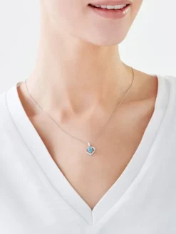 Zawieszka z  białego złota z brylantem i topazem - serce - próba 375