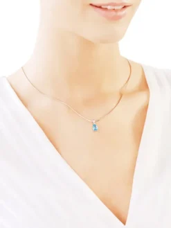 Zawieszka z białego złota z diamentem i topazem - próba 375