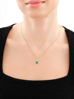 Zawieszka z żółtego i białego złota z brylantami i szmaragdem - próba 585