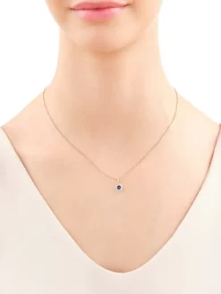 Zawieszka z żółtego i białego złota z diamentami i szafirem - próba 585