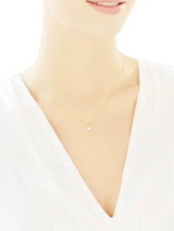 Zawieszka z żółtego i białego złota z brylantem - 0,10 ct - próba 585