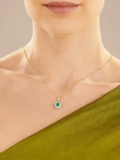 Zawieszka z żółtego i białego złota z brylantami i szmaragdem - próba 585