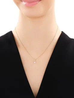 Zawieszka z żółtego i białego złota z brylantem - 0,05 ct - próba 585