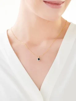 Zawieszka z żółtego i białego złota z diamentami i szafirem - próba 585