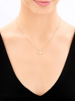 Zawieszka z żółtego i białego złota z brylantem - 0,18 ct - próba 585