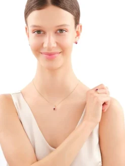 Zawieszka z żółtego i białego złota z brylantami i rubinem - próba 585