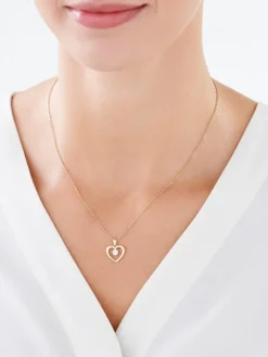 Zawieszka z żółtego i białego złota z brylantami - serce - 0,06 ct - próba 585