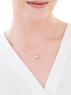 Zawieszka z żółtego złota z brylantem i perłą - próba 585