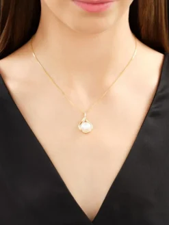 Zawieszka z żółtego złota z brylantami i perłą South Sea - próba 750