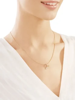 Zawieszka z żółtego złota z brylantami - serca - 0,01 ct - próba 585