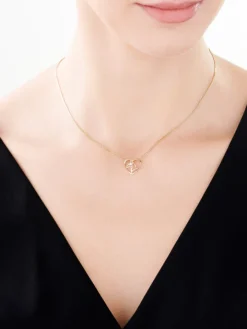 Zawieszka z żółtego złota z brylantem - serce, koń - 0,008 ct - próba 375