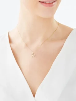 Zawieszka z żółtego złota z brylantem - serce - 0,008 ct - próba 375