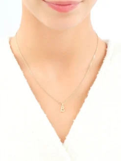 Zawieszka z żółtego złota z diamentem - litera B - 0,003 ct - próba 375