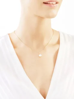 Zawieszka z żółtego złota z diamentami i perłą - próba 375