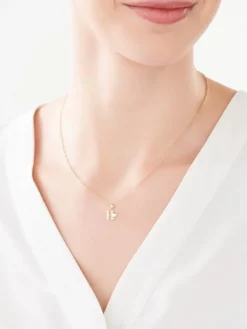 Zawieszka z żółtego złota z diamentem - litera H - 0,004 ct - próba 375