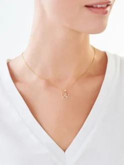 Zawieszka z żółtego złota z diamentem - litera A, serce - 0,005 ct - próba 375