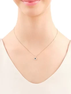 Zawieszka z żółtego złota z diamentami i szafirem - próba 585