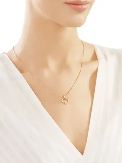 Zawieszka z żółtego złota z diamentem - serca - 0,003 ct - próba 585