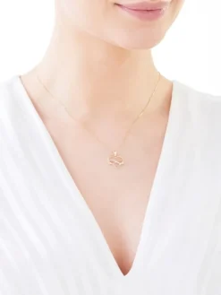 Zawieszka z żółtego złota z diamentami - serce, nieskończoność - 0,01 ct - próba 585