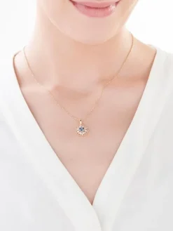 Zawieszka z żółtego złota z diamentami i topazem London Blue - próba 585