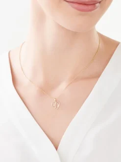 Zawieszka z żółtego złota z diamentem - litera D, serce - 0,005 ct - próba 375